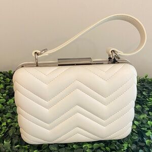 Olga Berg White Chevron Quilted Wristlet Clutch